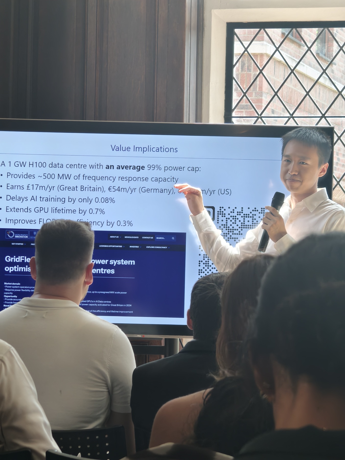 Yihong Zhou presenting research on grid-intelligent AI data centres at London Climate Action Week